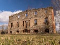 Wonderful landscape with ruins of an old manor house, trees in the old building, early spring Royalty Free Stock Photo