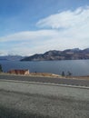 A wonderful landscape view of the mountain range and Okanagan Lake. Royalty Free Stock Photo