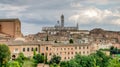 The wonderful medieval city of Siena with Siena Cathedral in Tuscany region on a cloudy day