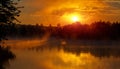 Wonderful misty evening. majestic golden sunset over the foggy lake