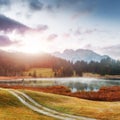 Wonderful misty landscape at Germanian Alps. Colorful Clouds on Blue Sky over the Karwendel mountains at early morning in autumn, Royalty Free Stock Photo