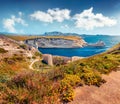 Wonderful morning scene of ruins of old Bonifacio fortress with Madonetta Lighthouse on background.