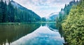 Wonderful morning view of Lacu Rosu lake. Spectacular summer scene of Harghita County, Romania, Europe. Beauty of nature concept b Royalty Free Stock Photo