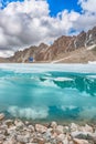 Wonderful mountain landscape with turquoise lake, reflection, peaks . Picturesque view near Adygine lake. Royalty Free Stock Photo