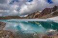 Wonderful mountain landscape with turquoise lake, reflection, peaks . Picturesque view near Adygine lake. Royalty Free Stock Photo