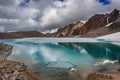 Wonderful mountain landscape with turquoise lake, reflection, peaks . Picturesque view near Adygine lake. Royalty Free Stock Photo