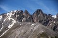 Wonderful mountains of Switzerland. Snow lies at the top of the ridge. Wildlife of incredible beauty. Rocks against the