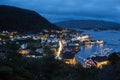 A wonderful Night shot of a city and harbor in Norway. beautiful landscape and light with sunset Royalty Free Stock Photo