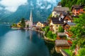 Wonderful old alpine village and misty morning, Hallstatt, Salzkammergut, Austria Royalty Free Stock Photo
