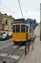 Wonderful Old Yellow Tram Circling The Streets In Lisbon. Nature, Architecture, History, Street Photography. April 11, 2014.
