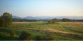 Wonderful panorama of the fields, mountains and sky