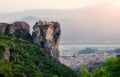 Wonderful Panoramic view Meteora monasteries, the Holy Monastery of Roussanou at foreground, Greece Sunny Morning with blue sky at Royalty Free Stock Photo