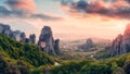 Wonderful Panoramic view of the rocks and monasteries of Meteora, Greece. Mysterious Sunny Morning with colorful sky, during Royalty Free Stock Photo