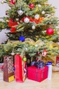 Wonderful presents under beautifully decorated christmas tree