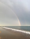 Wonderful rainbow over the sea and the beach in Turkey after heavy rain