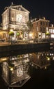 A wonderful reflection of the illuminated Waag in the water of the Rijn, Leiden, Netherlands