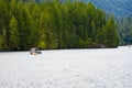 wonderful rest with boat ride on the picturesque mountain Merwin Lake with an evergreen forest Royalty Free Stock Photo