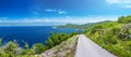 Wonderful romantic summer afternoon landscape panorama coastline Adriatic sea. A narrow mountain road above the cliffs along the c Royalty Free Stock Photo