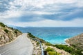 Wonderful romantic summer afternoon landscape panorama coastline Adriatic sea. A narrow mountain road above the cliffs along the c Royalty Free Stock Photo