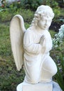 Wonderful Sculpture of a prayer angel. architecture, statue, archetype, religion, Royalty Free Stock Photo