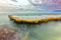 Wonderful seascape with sea waves hitting large rock Royalty Free Stock Photo