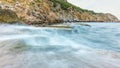 Wonderful seascape with sea waves hitting large rock Royalty Free Stock Photo