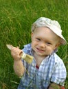 Wonderful smiling child with a brush for painting