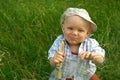 Wonderful smiling child with a brush for painting