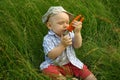 Wonderful smiling child with a orange pliers