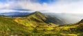 Wonderful springtime panoramic landscape in mountains at sunrise.Farcau Peak. Maramures. Romania. Royalty Free Stock Photo