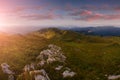 Wonderful springtime panoramic landscape in mountains at sunrise.Farcau Peak. Maramures. Romania. Royalty Free Stock Photo
