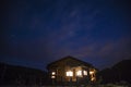 Wonderful starry sky above the farm house. Royalty Free Stock Photo