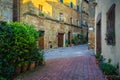 Wonderful street and entrances decorated with colorful flowers, Tuscany, Italy Royalty Free Stock Photo