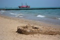 A castle on the sand with shells Royalty Free Stock Photo