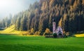 Wonderful Sunny Landscape of Dolomite Alps. St Johann Church, Santa Maddalena, Val Di Funes, Dolomites, Italy. Fairy velley in Royalty Free Stock Photo