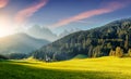 Wonderful Sunny Landscape of Dolomite Alps. St Johann Church, Santa Maddalena, Val Di Funes, Dolomites, Italy. Fairy velley in Royalty Free Stock Photo