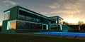 A wonderful sunset in an advanced villa illuminated by a light blue LED strip along the entire facade. Lighting creates an