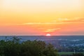 A wonderful sunset with a few fluffy clouds, covering the rolling hills in Bemelen in south Limburg in the Netherlands Royalty Free Stock Photo