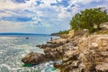 Wonderful turquoise and rocky beach and promenade Novi Vinodolski Croatia