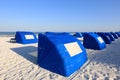 Blue Beach Cabanas on a White Sand Tropical Beach