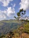 Wonderful view of big fluffy cloud over top of mo Royalty Free Stock Photo