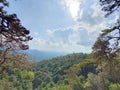 Wonderful view of big fluffy cloud over top of mo Royalty Free Stock Photo