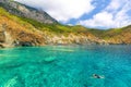 The wonderful view of the blue Mediterranean and the rocky shore surface in the American Cove of Adrasan.