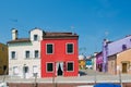 Walking through the streets of Burano. Colorful houses. Royalty Free Stock Photo