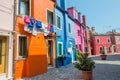 Walking through the streets of Burano. Colorful houses. Royalty Free Stock Photo