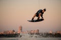 wonderful view of male wakeboarder while jumping in the air on wakeboard Royalty Free Stock Photo