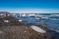 Wonderful view of oceanic black sand beach called Diamonds beach, with floating ice from Glacier Lagoon, Jokulsarlon, Iceland Royalty Free Stock Photo