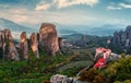 Wonderful view of the rocks and monasteries of Meteora, Greece. Mysterious Sunny Morning with blue sky at sunny day. Awesome Royalty Free Stock Photo