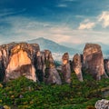 Wonderful view of the rocks and monasteries of Meteora, Greece. Mysterious Sunny Morning with blue sky at sunny day. Awesome Royalty Free Stock Photo