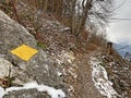 Wonderful winter hiking trails on the fresh alpine snow cover of the Churfirsten mountain range and above the Lake Walen Royalty Free Stock Photo